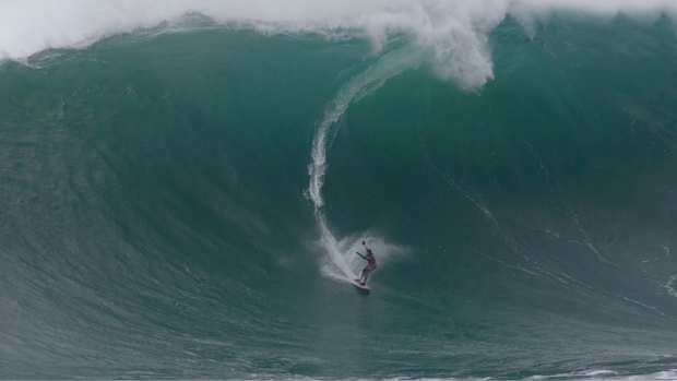 Bianca Valenti falls on a huge wave at Mavericks on December 23, 2023.