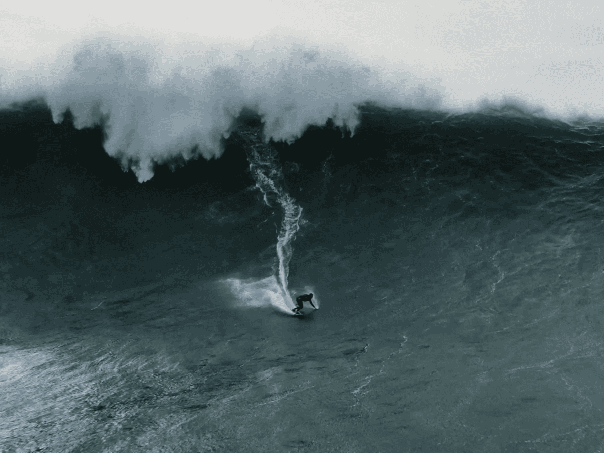 Big wave surfer Sebastian Steudtner from Germany rides a wave during a tow  surfing session at Praia do Norte on the first big swell of winter season.  (Photo by Henrique Casinhas /