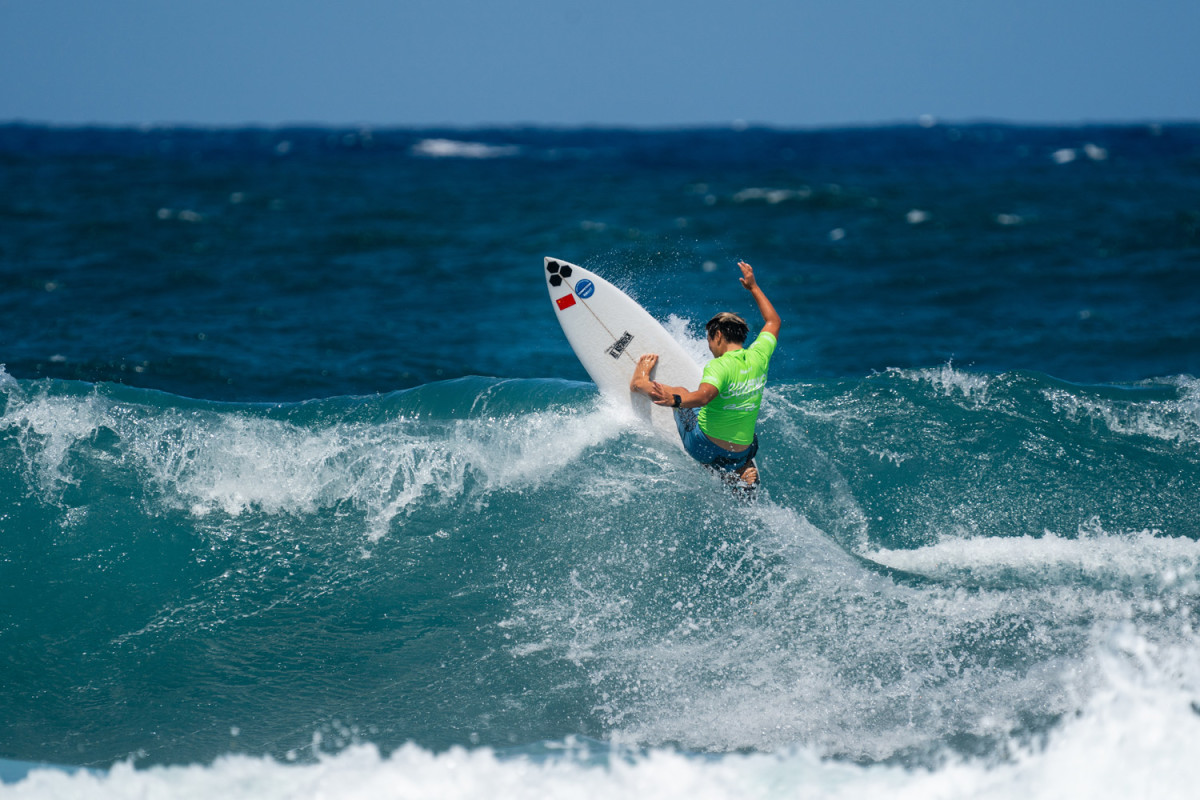 The first-ever Olympic surfer from China, 14-year-old Siqi Yang.