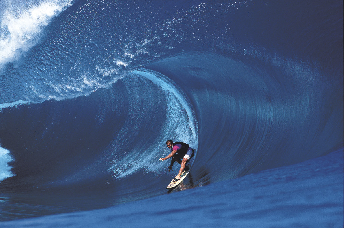 Laird Hamilton's “Millennium Wave,” pictured here, ushered in a new age of big-wave progression. When he let go of the tow rope, the era of bigger, deeper, wider, and thicker began.