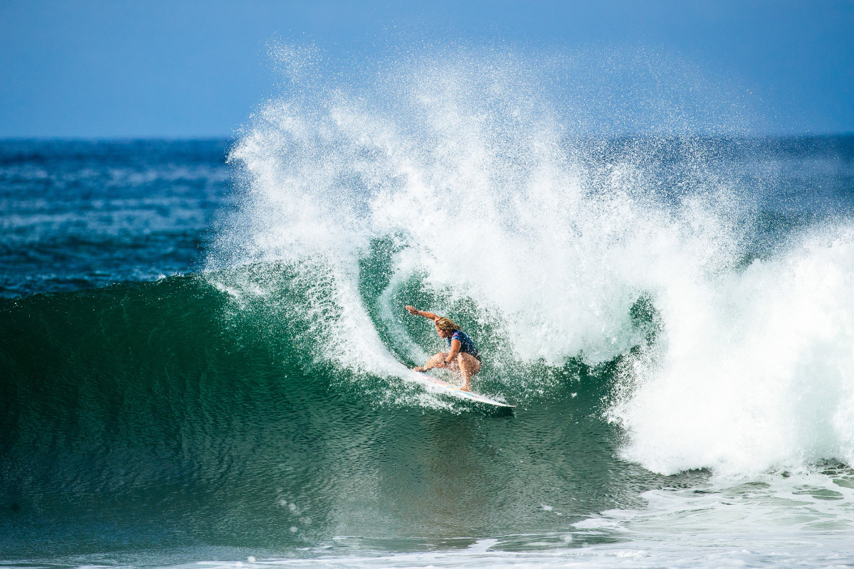 Gabriela Bryan surfing in El Salvador